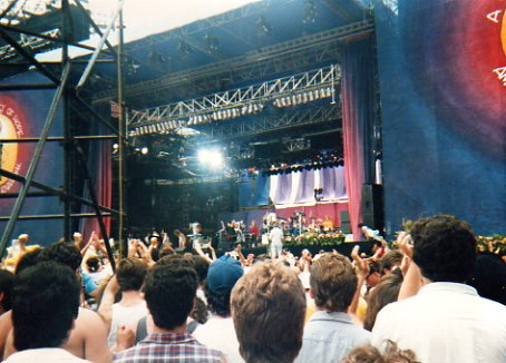 Photo taken from my spot in the field for the Amnesty International show at Giants Stadium on June 15, 1986. Philly's The Hooters are on stage. Guy in white shirt at far right would later throw an ice cube that hit Joni Mitchell's guitar and exploded as she performed. He was a real piece of crap.